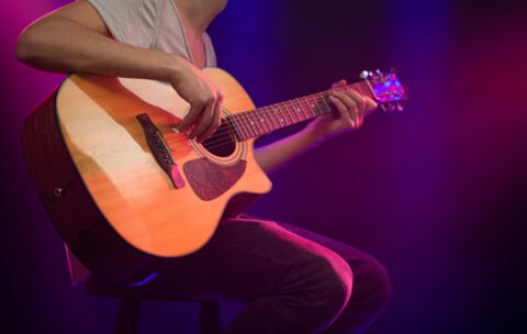 musician-plays-acoustic-guitar (1)